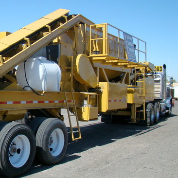 Nescon's Cold-in-Place Recycle Train is built for results. The unit is unique in the fact that it has a front discharge, single trailer design